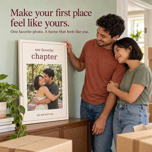 Couple decorating their first apartment with an Our Favorite Chapter photo canvas; illustrative lifestyle mockup.