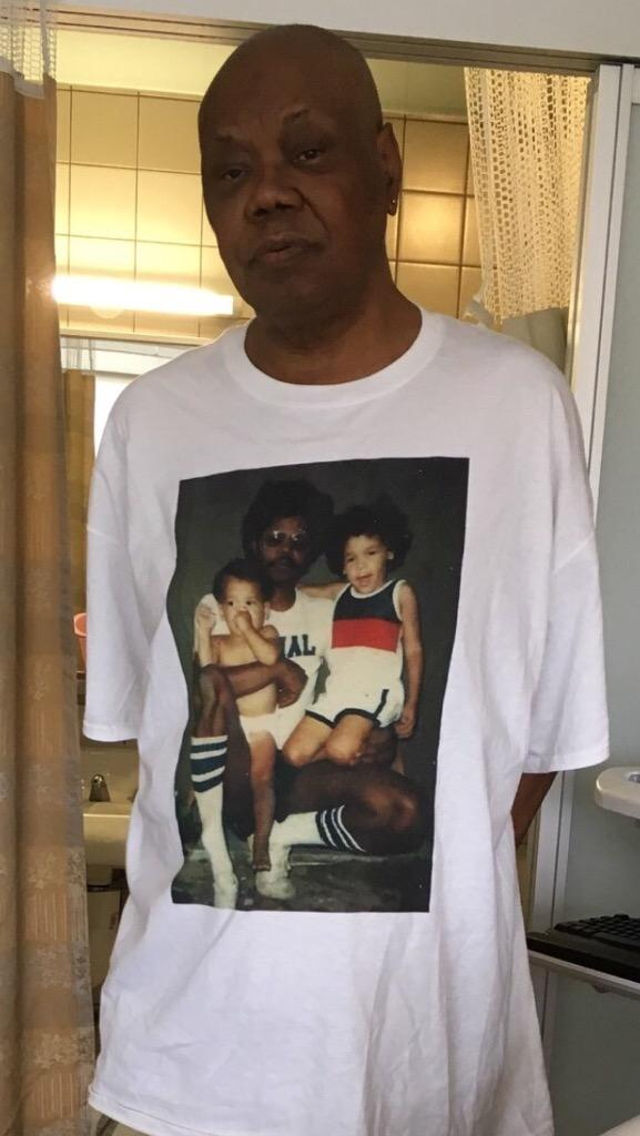Person wearing a white custom photo T-shirt printed with a vintage family photo