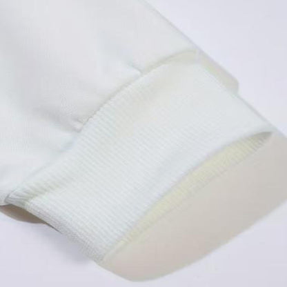 White long sleeve shirt ribbed sleeve cuff and seam close-up