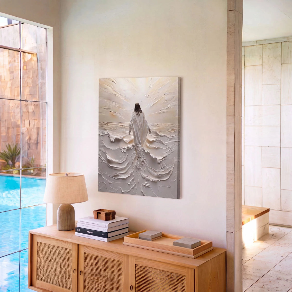 Jesus walking on water canvas above a wooden sideboard in a modern room