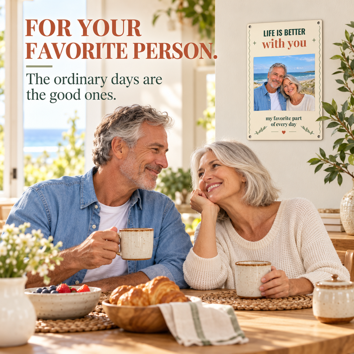 Older couple and their personalized beach photo sign in a breakfast setting